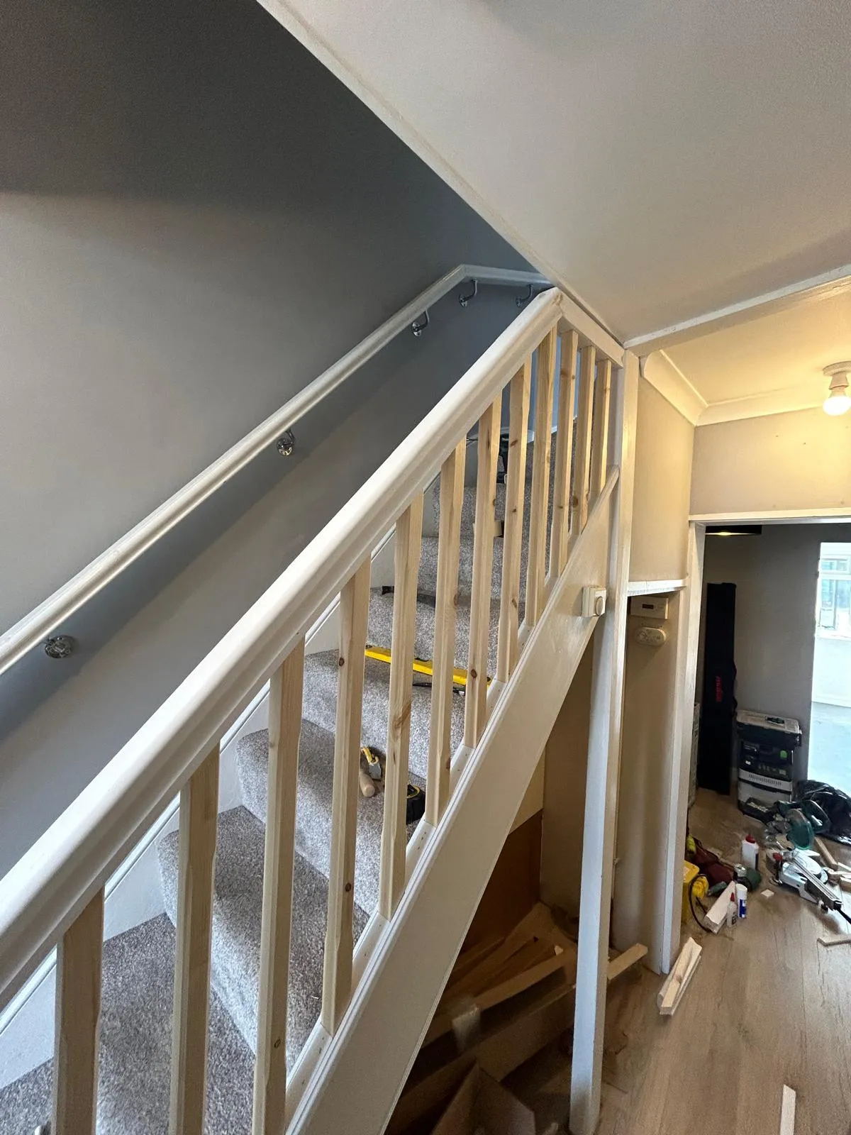 The staircase, with new spindles on the balustrade