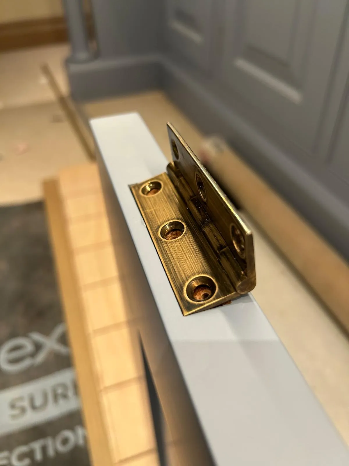 Brass butt hinges on the in-frame doors