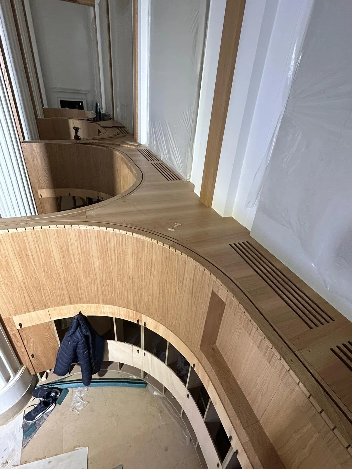Curved oak panelling going onto the frame