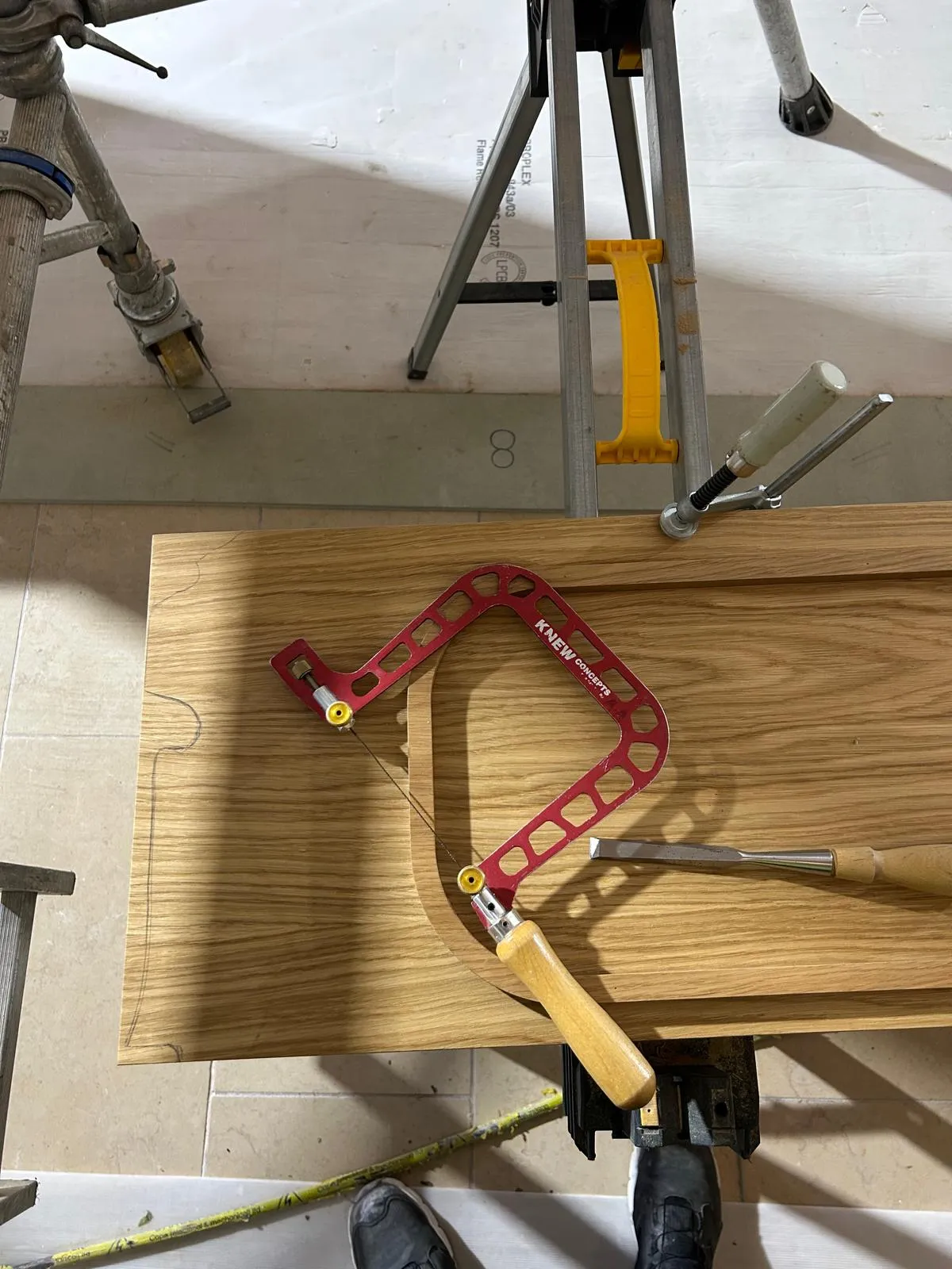 The oak panel clamped, halfway round the profile