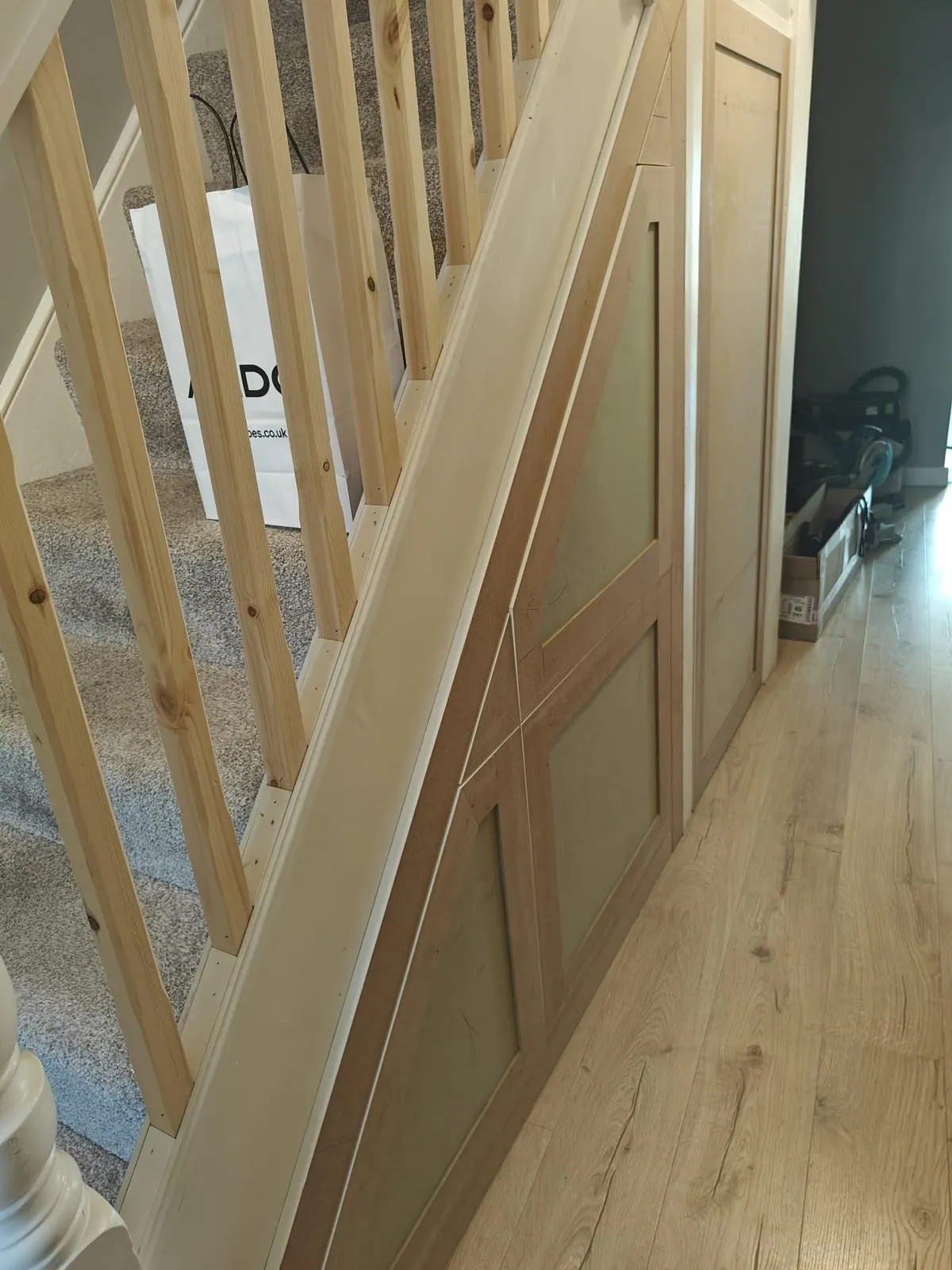 Angled shaker doors, fitted and ready for paint