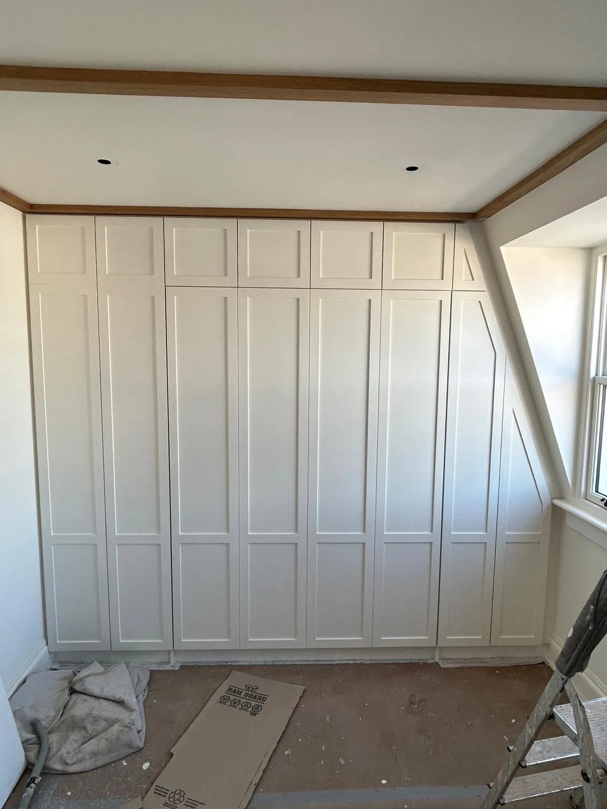 Doors cut to the angle of the ceiling